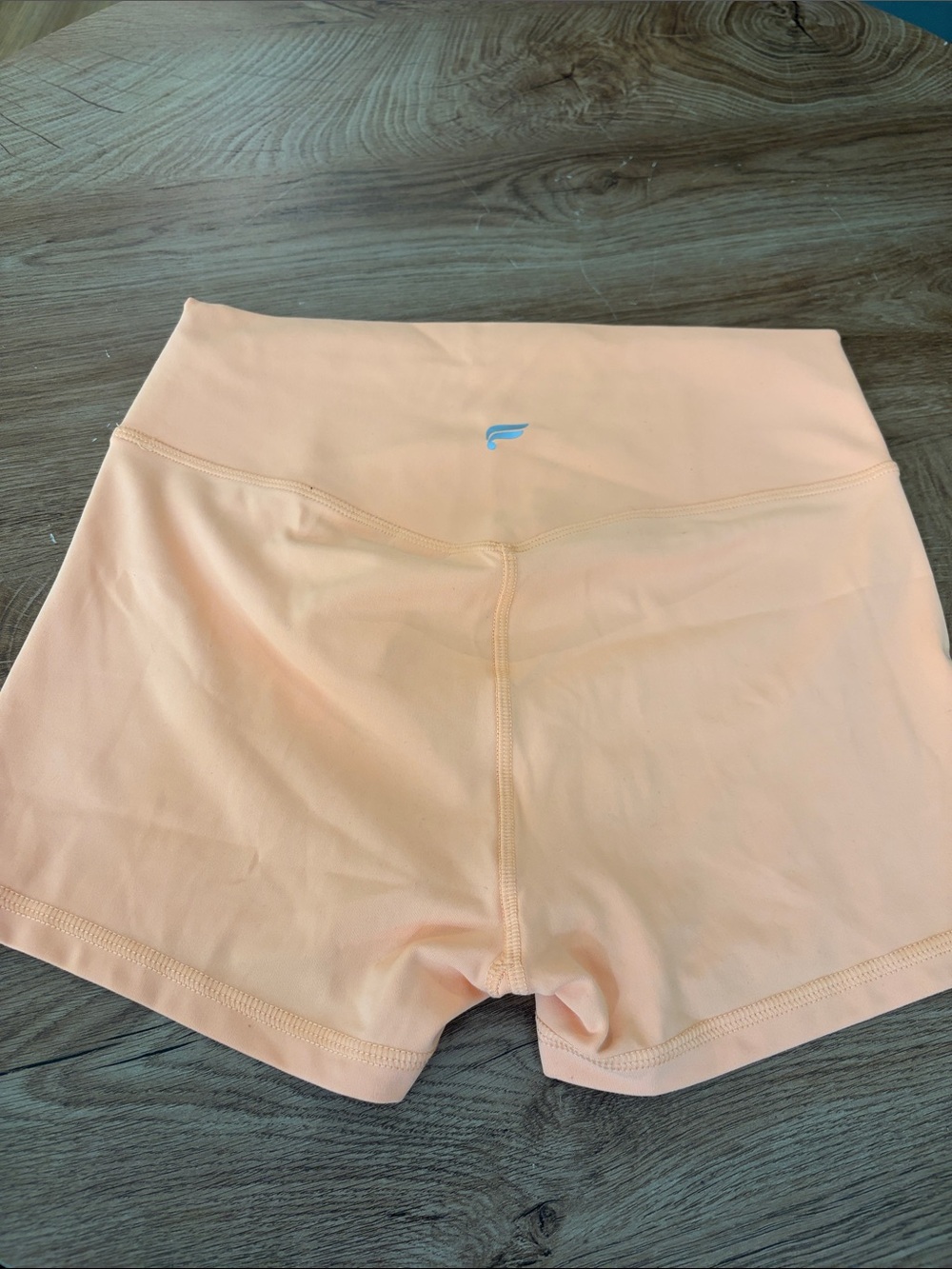 Fabletics PureLuxe Peach High-Rise Shorts with Subtle Logo